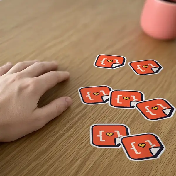 Seven copies of one die-cut StickerCon sticker beside a hand, about 50 mm plus the cut border.