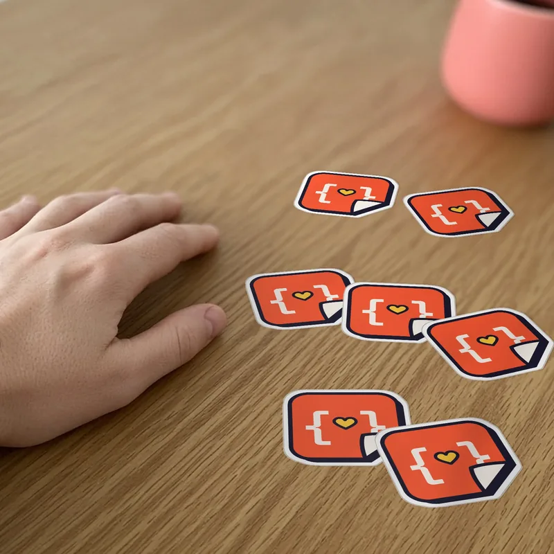 Seven copies of one die-cut StickerCon sticker beside a hand, about 50 mm plus the cut border.