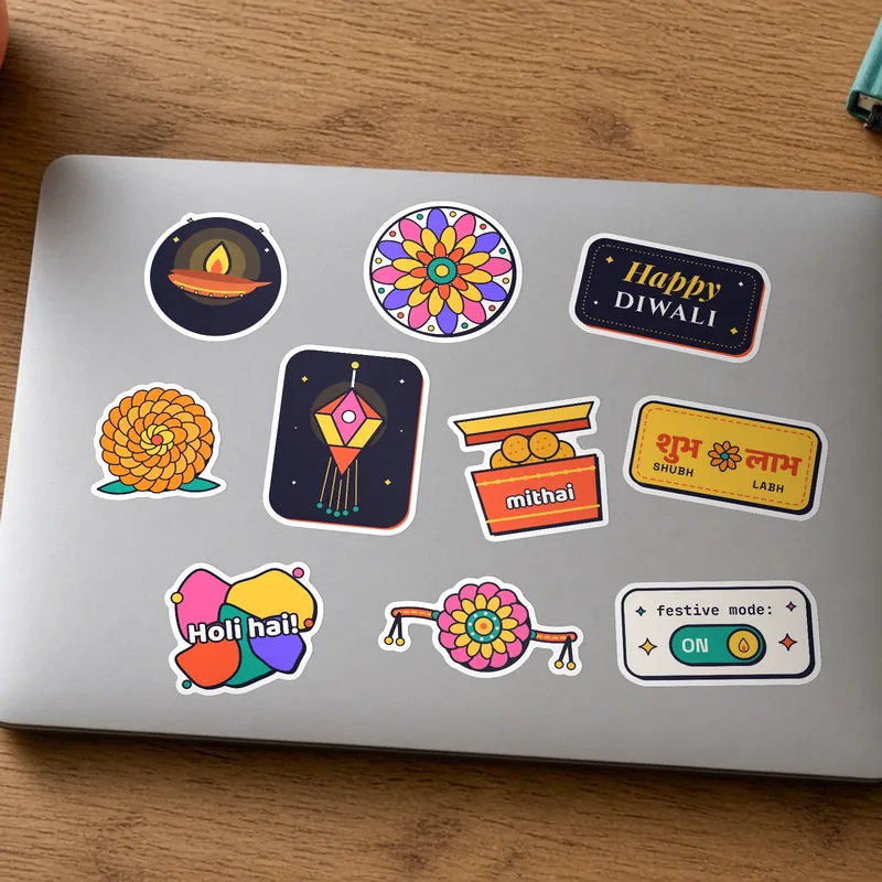 Ten festive stickers applied on a laptop lid.